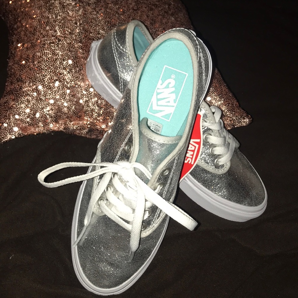 Metallic silver Vans